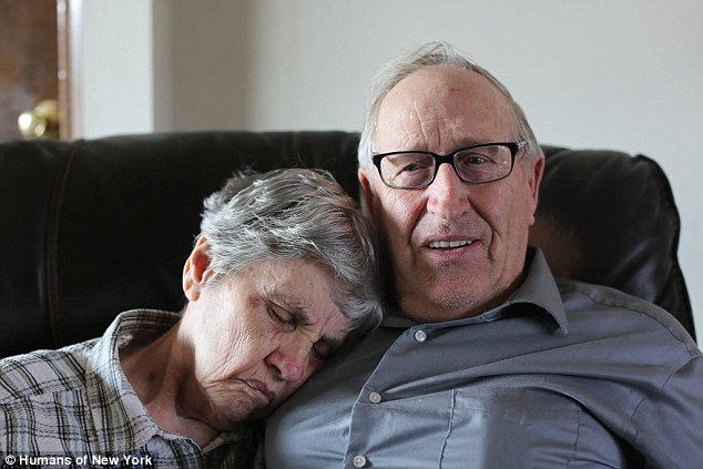 elderly man with his wife, she has Alzheimer's