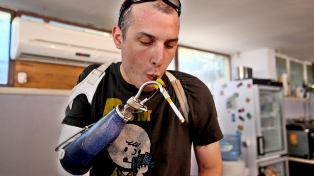 An injured IDF soldier uses medical cannabis (photo credit: Abir Sultan/Flash90)