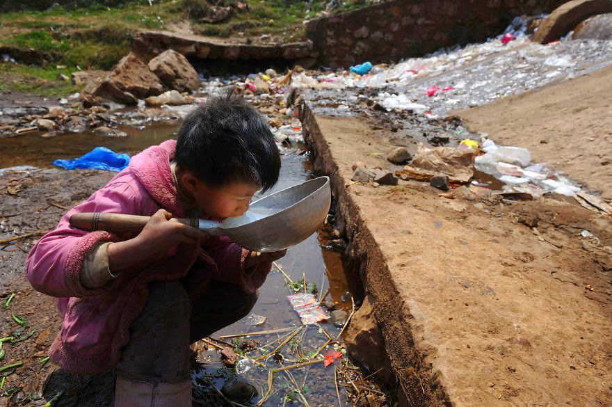 Child Drinks Polluted Water
