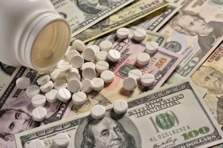 pills on top of money