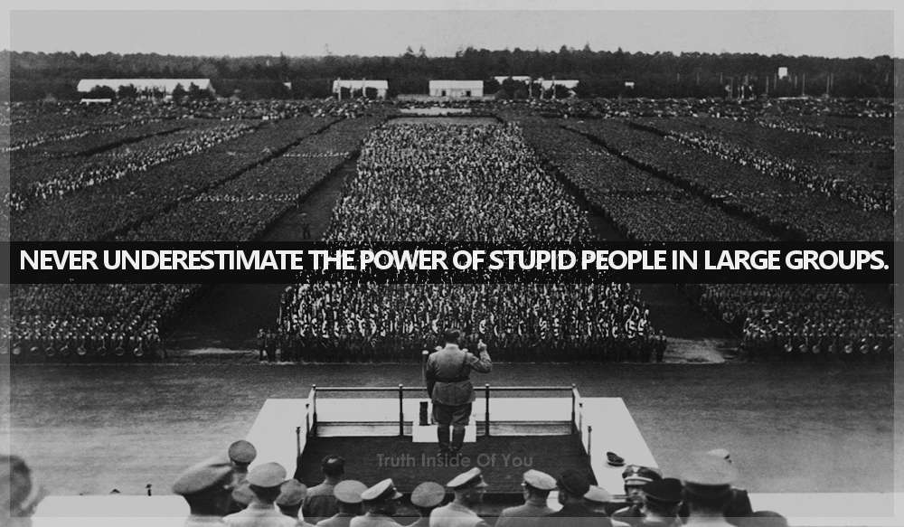 Never underestimate the power of stupid people in large groups.