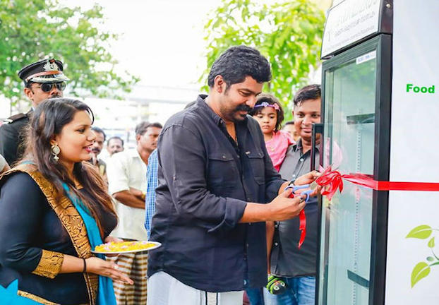 A restaurant placed a fridge on the streets to give homeless leftover food.