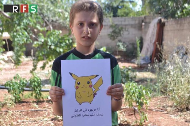 The touching photos of children from Syria with Pokemon Go characters. (2)