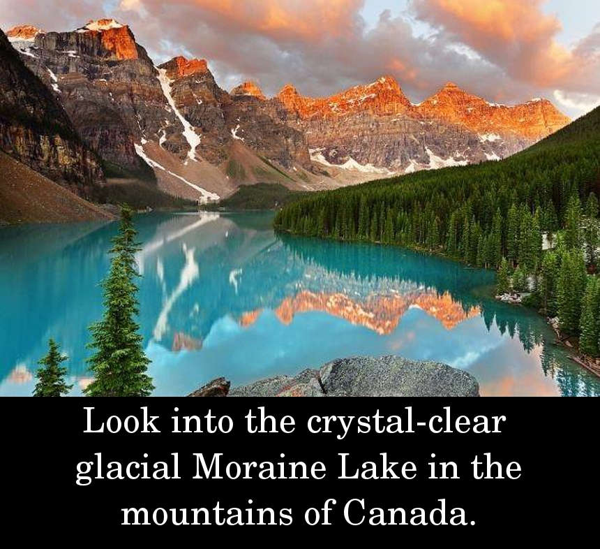 Look into the crystal-clear glacial Moraine Lake in the mountains of Canada.