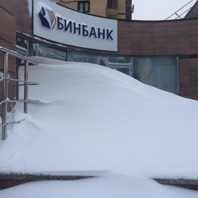 2. Apparently, nature thought it was a chilly day to work anyway, so piled up snow before the doors.