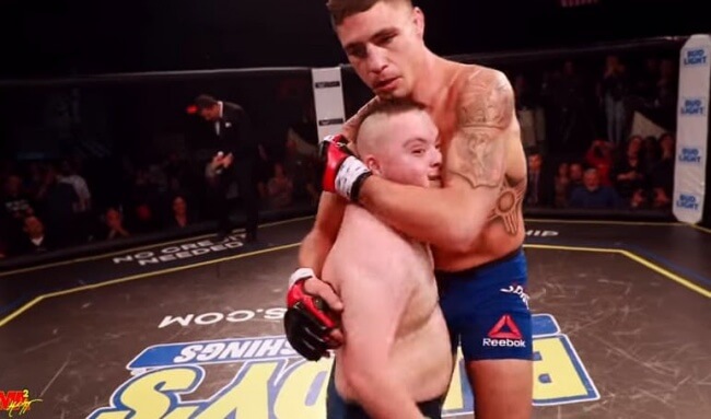 2. UFC fighter makes a Down's syndrome fans dream come true.