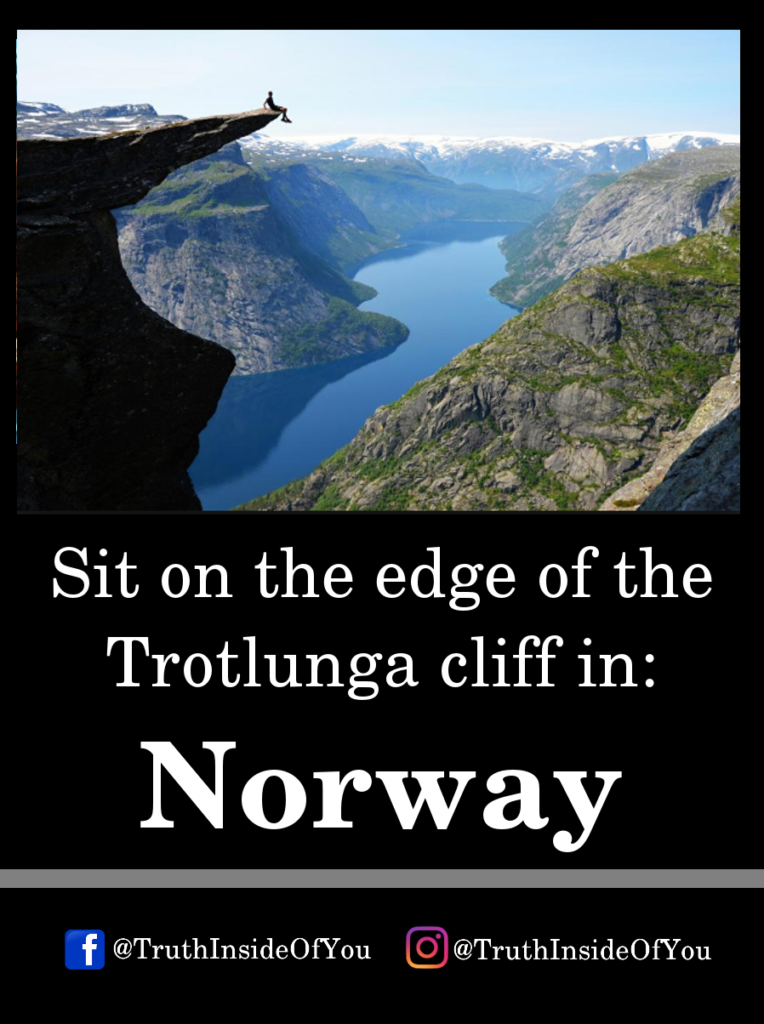 Sit on the edge of the Trotlunga cliff in_ Norway