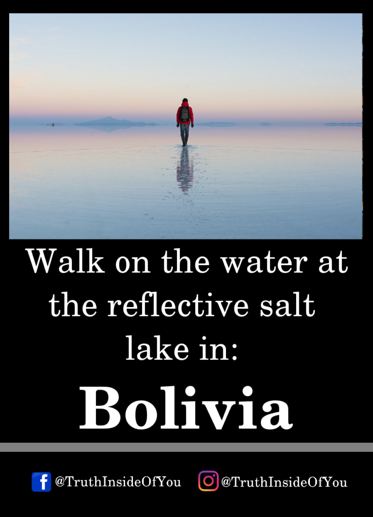 Walk on the water at the reflective salt lake in_ Bolivia