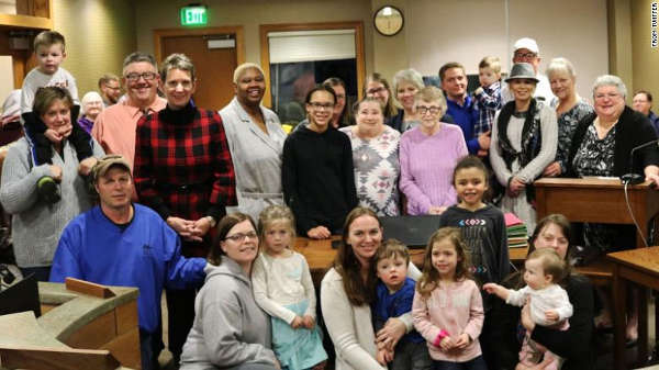 Linda Herring, in the purple sweater, was honored for fostering more than 600 children.